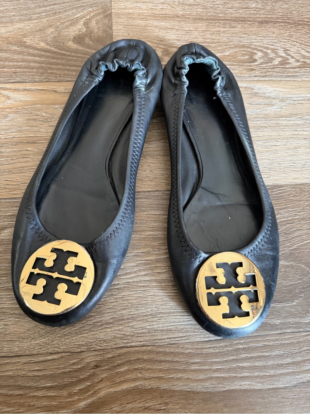 Tory Burch Black Leather Logo Ballet Flats with Gold Medallion